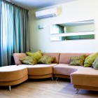 Corner in modern studio interior with sofa