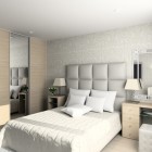 Standard bed frame in bright bedroom