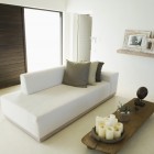 Living room with white chaise lounge