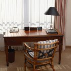 Wood desk by a bright window