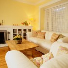Hardwood flooring with yellow walls