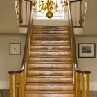 Original wood stairs leading up two lights