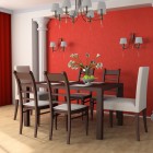 Chandelier and sconces in orange dining room